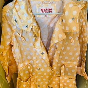 Really cute yellow with white polka dot raincoat